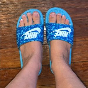 Blue nike slides